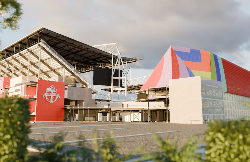 North side of Toronto Stadium with an open-air seating section and vibrant mural-covered building