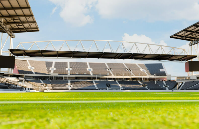 Rendering of the South end of  Toronto Stadium with green grass under a cloudy sky