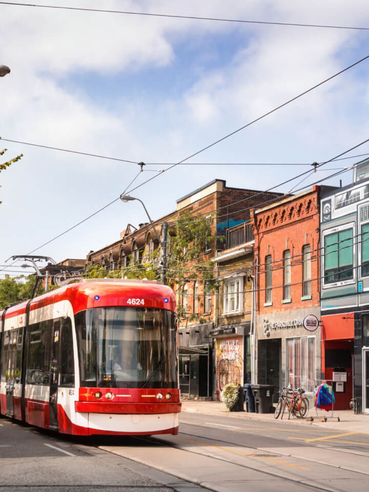 A Toronto streetcar glides down a Parkdale street